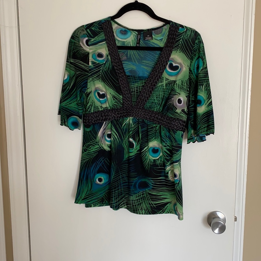 NEW DIRECTIONS Top! PM